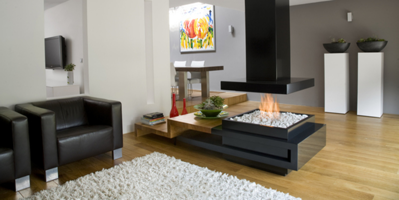 hip & happening woonkamer modern zwart rechthoek gas rondom open vuur 